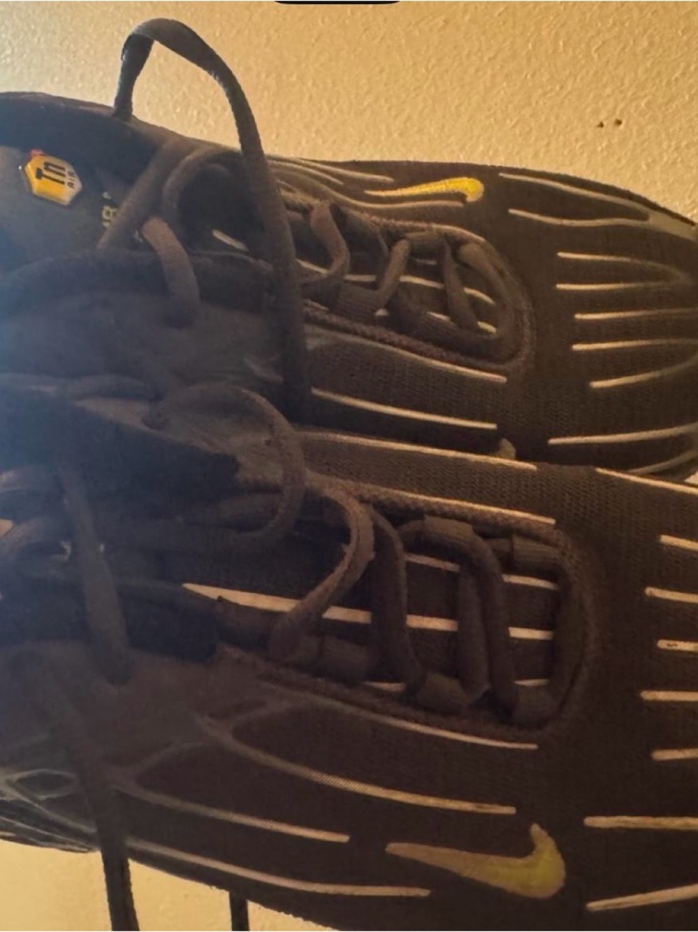 Nike Men’s Black Athletic Sneakers with Yellow Swoosh